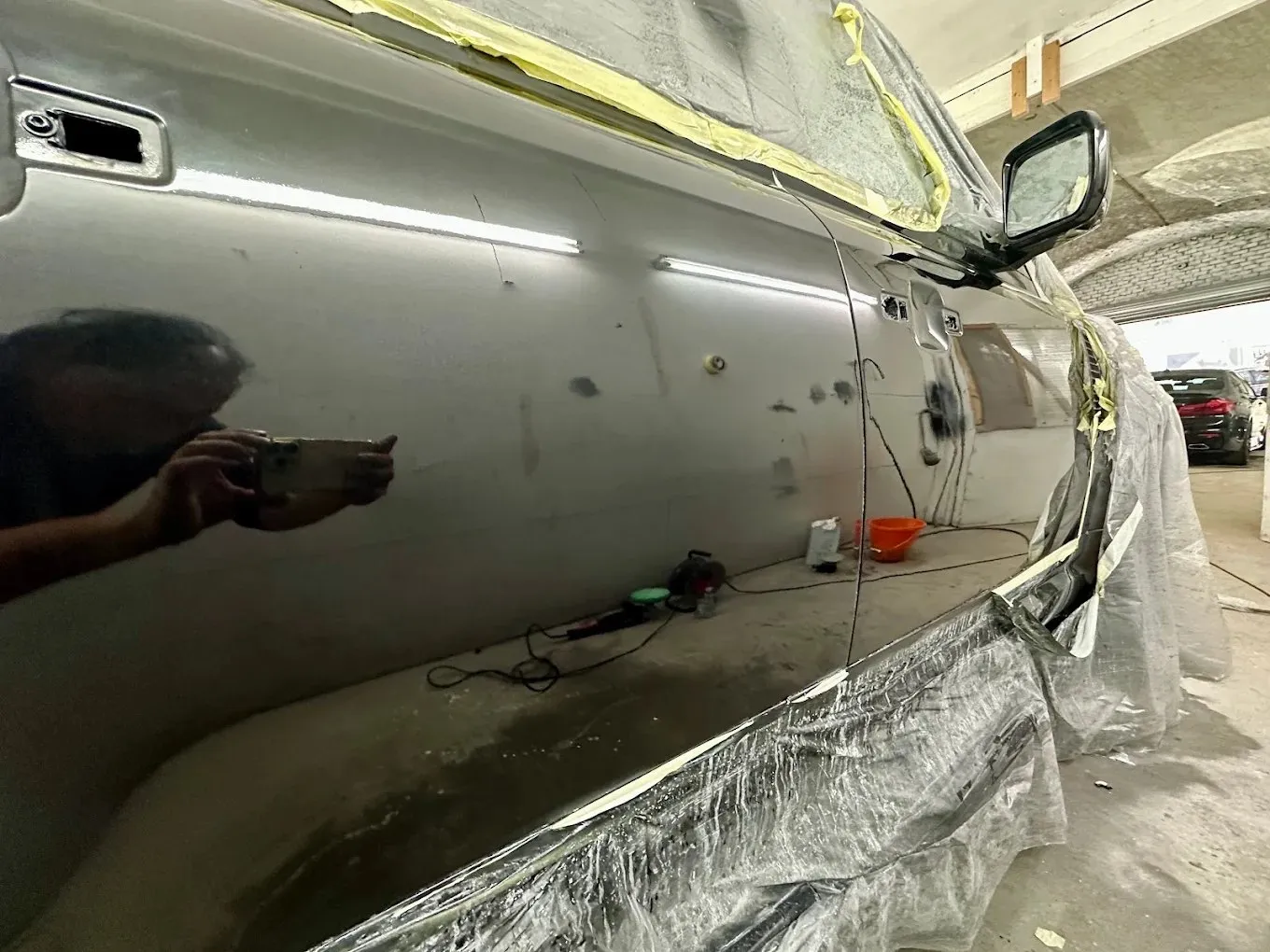 Door dents filled and flatted before primer