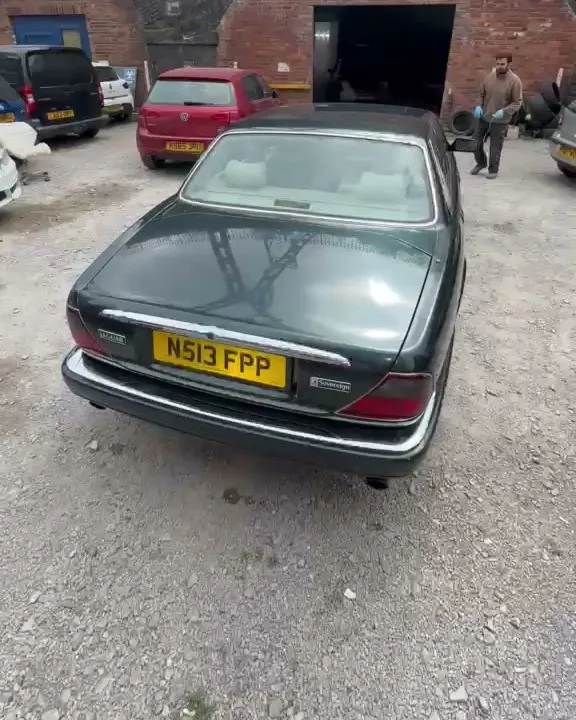 Back outside: Jaguar XJ Sovereign, prepped and painted